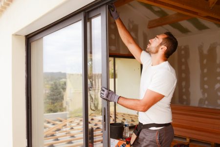 Handsome,Young,Man,Installing,Bay,Window,In,A,New,House Handsome,Young,Man,Installing,Bay,Window,In,A,New,House
